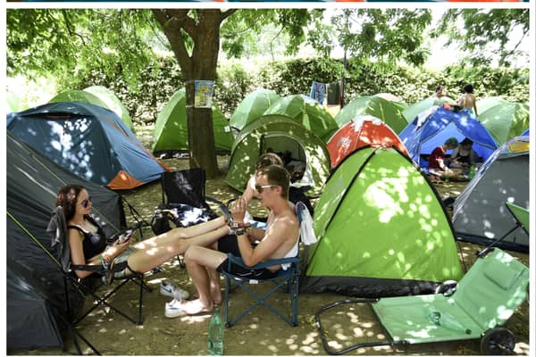 Here are 8 top tips from our experts on how to stay healthy at Glastonbury Festival. (Photo: Leon Neal/Getty Images, NENAD MIHAJLOVIC/AFP via Getty Images)