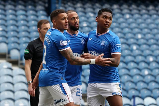 Kemar Roofe of Rangers celebrates with James Tavernier and Alfredo Morelos. (Photo by Ian MacNicol/Getty Images)
