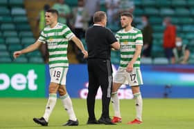 Celtic manager Ange Postecoglou with Tom Rogic and Ryan Christie. (Photo by Steve  Welsh/Getty Images)