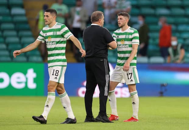 Celtic manager Ange Postecoglou with Tom Rogic and Ryan Christie. (Photo by Steve  Welsh/Getty Images)