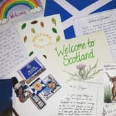 Members of the public who have donated to Refuweegee have been asked to write a note and leave a token of Scotland in the bundles to make refugees feel at home. Picture: Refuweegee