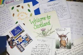 Members of the public who have donated to Refuweegee have been asked to write a note and leave a token of Scotland in the bundles to make refugees feel at home. Picture: Refuweegee