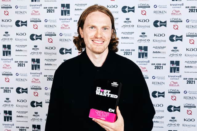 Paddy McDougall with his award.