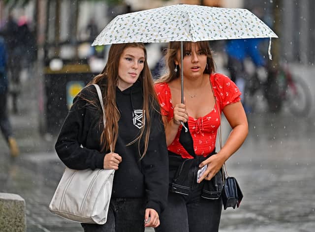 Members of the public make their way through the rain on Sauchiehall Street last month. (Photo: by Jeff J Mitchell/Getty Images)