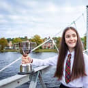 Maria Monk  from Glasgow Gaelic School is winner of the Solo Singing Fluent - Girls ages 13-15 - Traditional Silver Pendant at The Royal National MÃ²d 2021, in Inverness, 