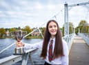 Maria Monk  from Glasgow Gaelic School is winner of the Solo Singing Fluent - Girls ages 13-15 - Traditional Silver Pendant at The Royal National MÃ²d 2021, in Inverness, 