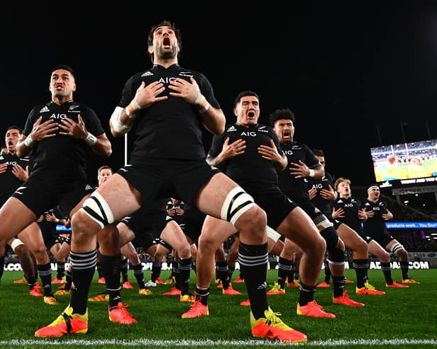 Rieko Ioane, Samuel Whitelock, Codie Taylor of the All Blacks perform the haka with the team ahead of the Rugby Championship and Bledisloe Cup match between the New Zealand All Blacks and the Australia Wallabies at Eden Park on August 07, 2021 in Auckland, New Zealand