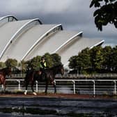 Police Scotland mounted officers patrol near the SSE Hydro venue in Glasgow.