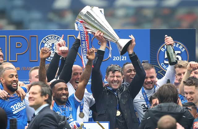 Rangers Manager Steven Gerrard lifts the trophy during the Scottish Premiership match between Rangers and Aberdeen