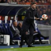 Steven Gerrard, Head Coach of Rangers throws the match ball during the UEFA Europa League group A match between Rangers FC and Olympique Lyon 
