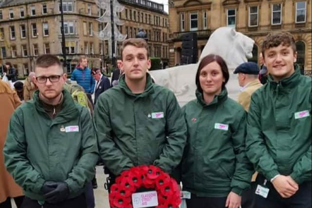 Some of the members - including John, second from left, and Becky - took part in the recent Remembrance service.