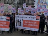 Cleaners and janitors rallied in George Square last week. 