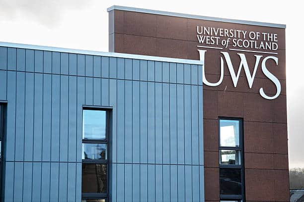 "Paisley, UK - January 8, 2013: UWS sign on buildings in the Paisley campus of the University of the West of Scotland. UWS was formed in 2007 from the merger of the University of Paisley and Bell College, Hamilton."