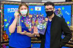 Megan Scally (finance director) and Shaqeel Hodgetts (operations director) with their new book.