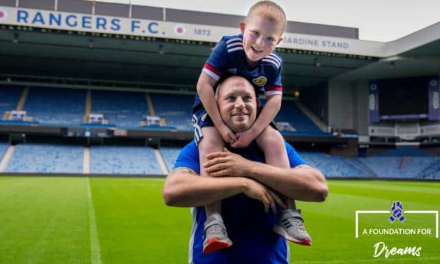 Leo Middleton and his dad, Barry, at Ibrox