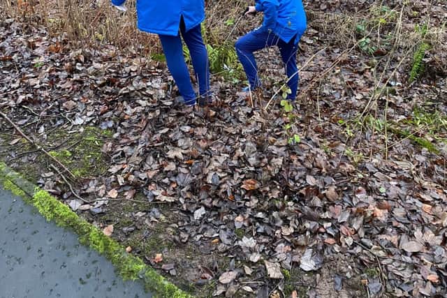 Players helping out during the litter pick