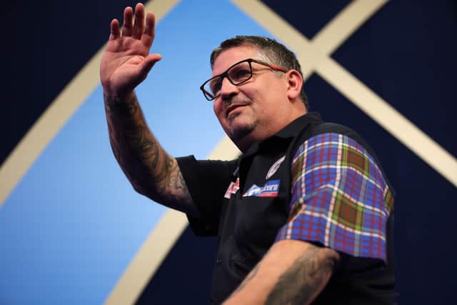 Gary Anderson of Scotland reacts during his Third Round Match against Ian White of England during Day Twelve of The William Hill World Darts Championship at Alexandra Palace on December 29, 2021