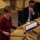 Nicola Sturgeon has announced that self-isolation has been cut from 10 days to seven day for those in Scotland. (Credit: Getty)