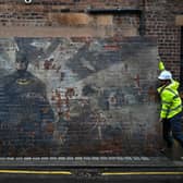 Robin is pictured with Batman in the mural. Picture: Jeff J Mitchell/Getty Images