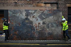 Robin is pictured with Batman in the mural. Picture: Jeff J Mitchell/Getty Images