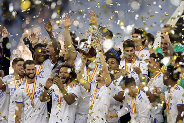Real Madrid celebrate their Spanish Super Cup triumph. Picture: FAYEZ NURELDINE/AFP via Getty Images