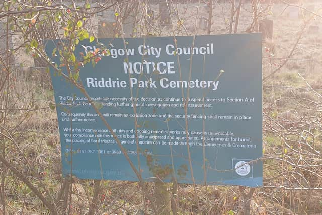 The sign at the fenced-off part of the cemetery.