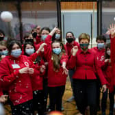 First Minister Nicola Sturgeon with the children’s chorus of A Midsummer Night’s Dream during her visit to Scottish Opera’s Production Studios. 