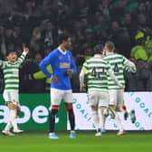 Reo Hatate of Celtic celebrates with team-mates after scoring the opening goal during the Cinch Scottish Premiership match between Celtic FC and Rangers FC at  on February 02, 2022 in Glasgow, Scotland