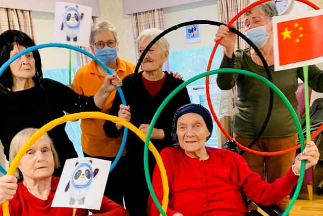 Care home residents doing their own Winter Olympics.