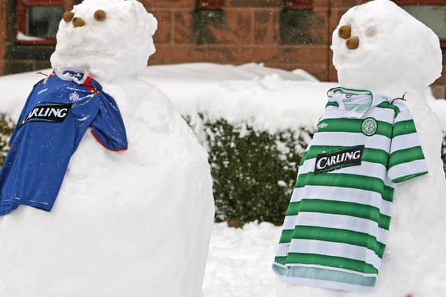 Snowmen wearing Rangers and Celtic strips in Glasgow during heavy snowfall several years ago.