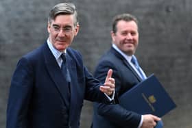 Former Leader of the House of Commons Jacob Rees-Mogg (L) and ex-Chief Whip Mark Spencer leave from 10 Downing Street (Photo by JUSTIN TALLIS/AFP via Getty Images)