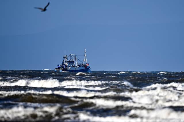 A view of a fishing trawler leaving Troon Harbour on February 21, 2022 in Troon, United Kingdom. Storm Franklin, which has prompted flood warnings and severe weather alerts across the UK, is the third storm to hit the UK in a week, following Eunice and Dudley. (Photo by Jeff J Mitchell/Getty Images)