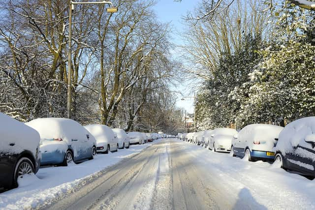 Snow covered  cars in Glasgow in 2018. (Photo: ANDY BUCHANAN/AFP via Getty Images)