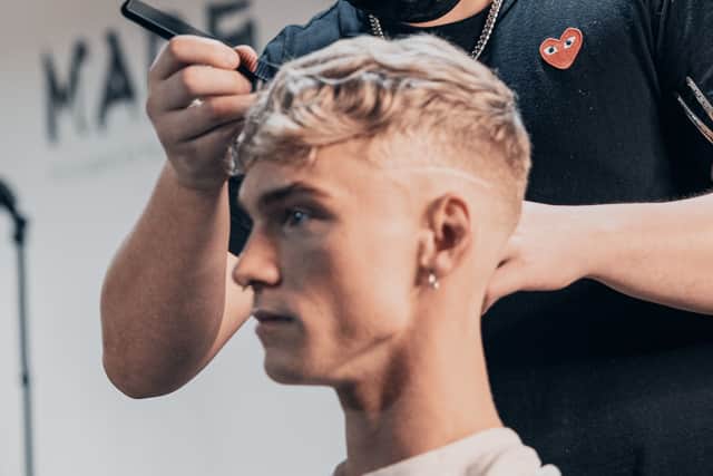Glaswegian teenager Edson McCall winning a UK barbering award