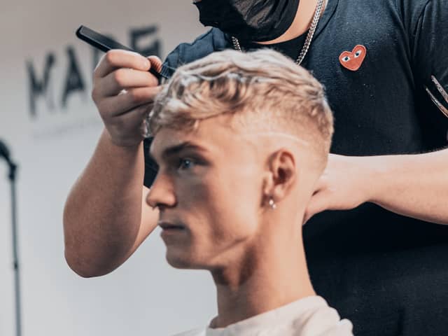 Glaswegian teenager Edson McCall winning a UK barbering award