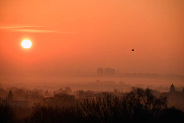 A view of the sun rising over Glasgow from Baljaffray.  (Photo by Jeff J Mitchell/Getty Images)