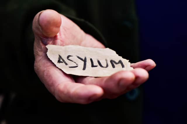 The report says asylum seekers are being kept in unsafe conditions.