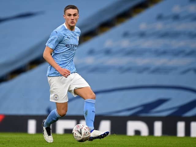 Taylor Harwood-Bellis has made eight senior appearances for Manchester City. Credit: Getty.
