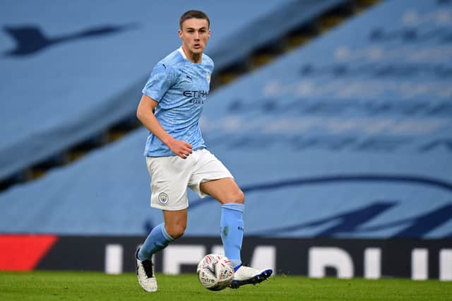 Taylor Harwood-Bellis has made eight senior appearances for Manchester City. Credit: Getty.