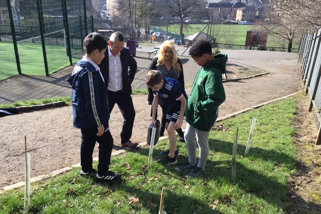 The pupils at Hyndland Primary have been planting new trees. Pic: Hyndland PS and Water Plus.