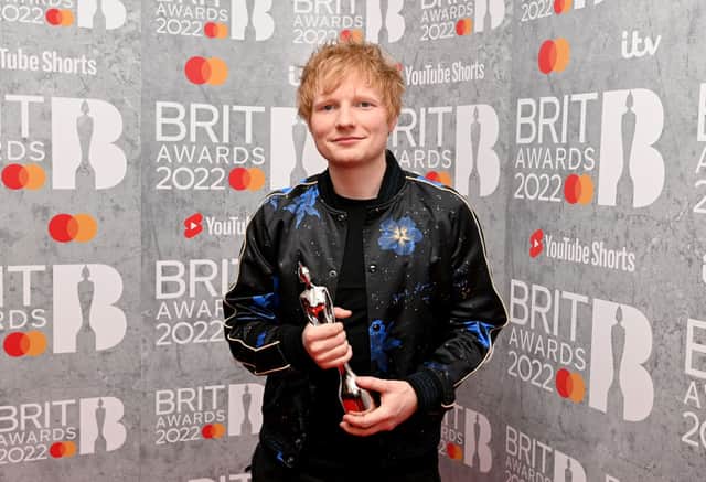 Ed Sheeran posing with his award in the media room during The BRIT Awards 2022 (Photo: Kate Green/Getty Images)