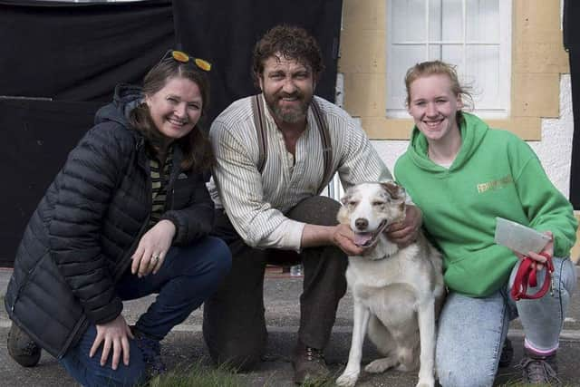 Animal trainer Bozena Bienkowska with Gerard Butler. 