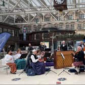 The Scottish Fiddle Orchestra at Glasgow Central.