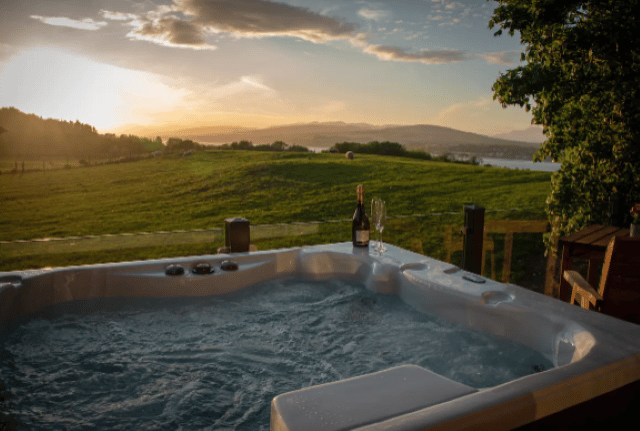 Enjoy the views from a private hot-tub (Image: AirBNB/Clyde View, Langbank)