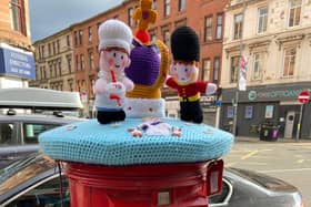 Knitted Platinum Jubilee decorations spotted on a post box on Dumbarton Road, Glasgow