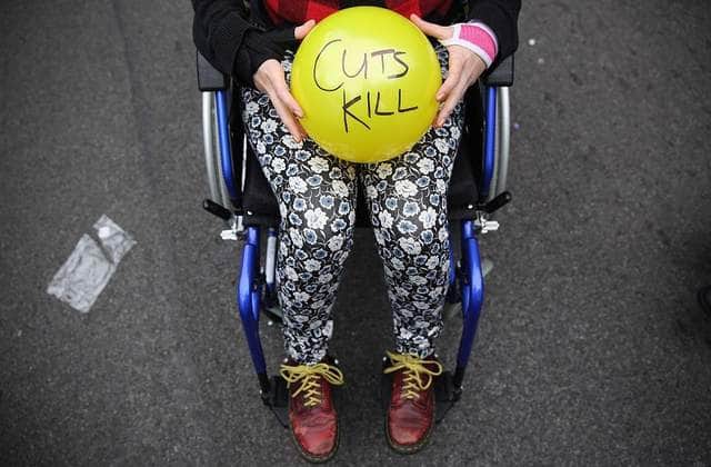 Anti austerity protesters prepare to throw balls towards Downing Street after the Chancellor of the Exchequer George Osborne left 11 Downing Street on July 8, 2015 in London, England. Photo by Dan Kitwood/Getty Images