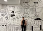 Artist Gillian McNeill with her latest work.
