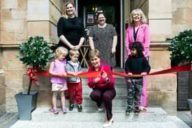 Nicola Sturgeon cutting the ribbon at the nursery.