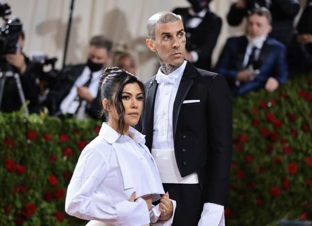<p>Travis Barker and Kourtney Kardashian at The 2022 Met Gala (Getty Images)</p>