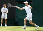 Andy Murray warming up ahead of Wimbledon.